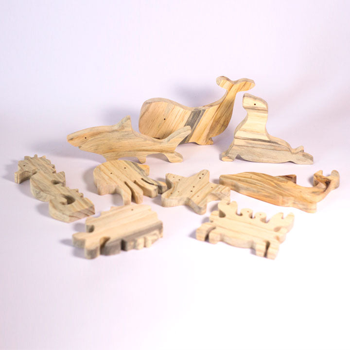 Collection of sea animals in wood x 9